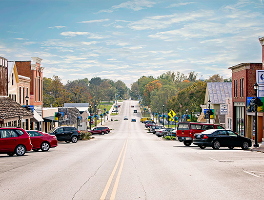 A lake with the Denver skyline the in the background.